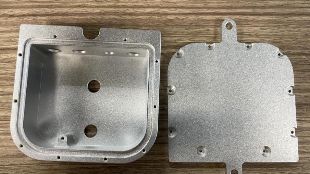 CNC machined anodized aluminium electronics housing for the new barn owl monitoring device 